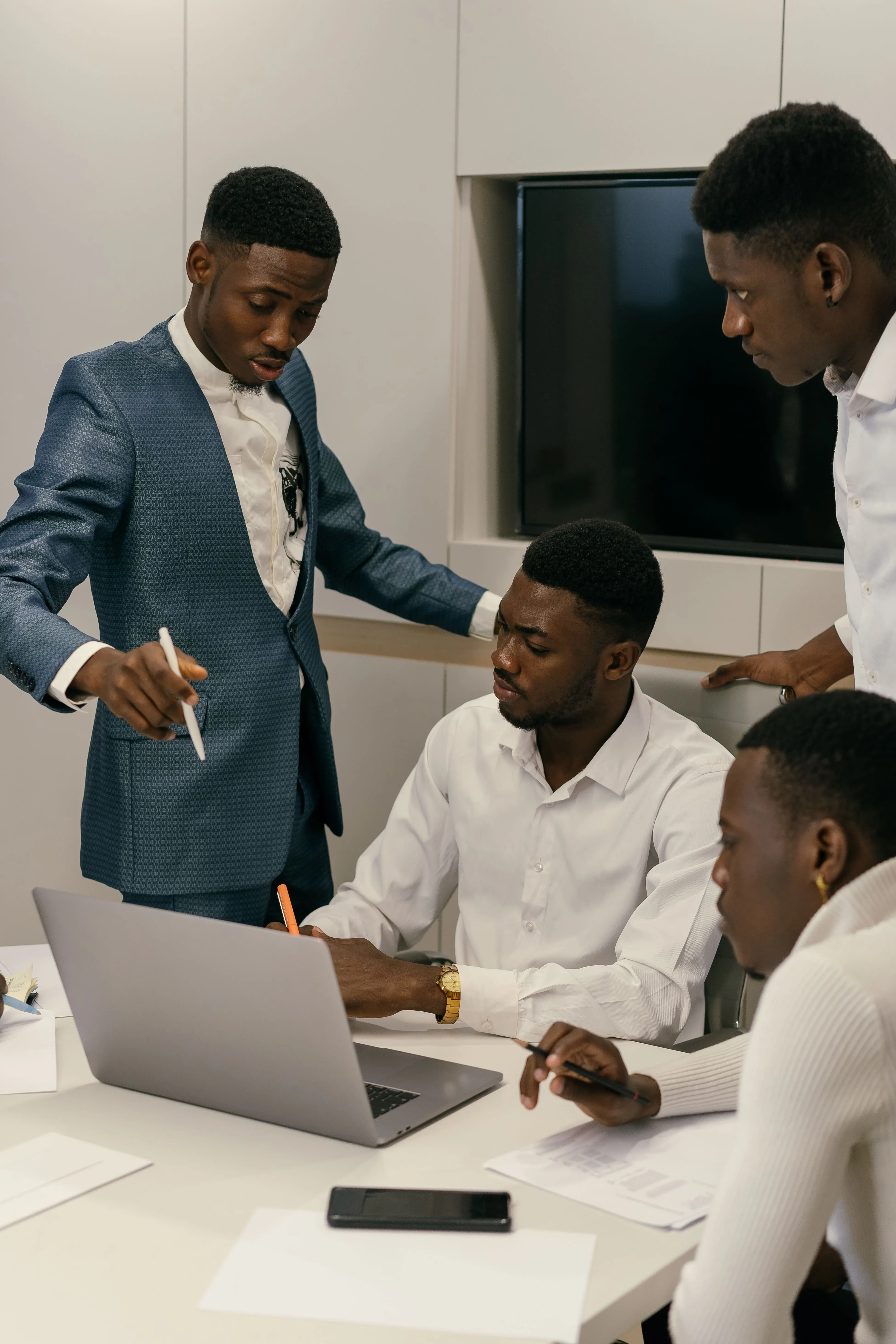 African technology leaders collaborating on a project